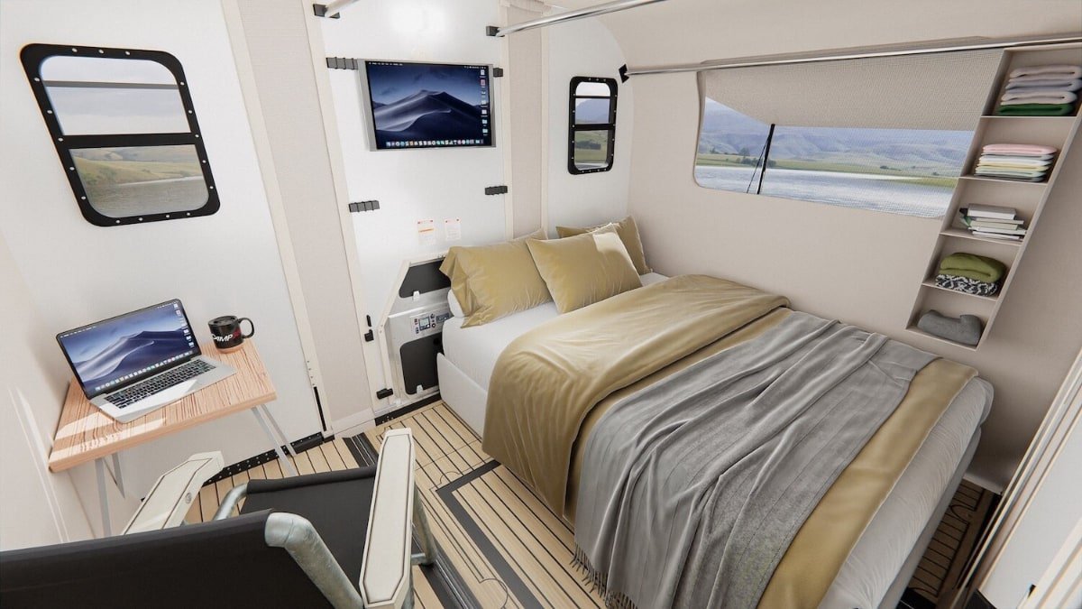 The camper includes a sleep and work area, as well as a place to cook
