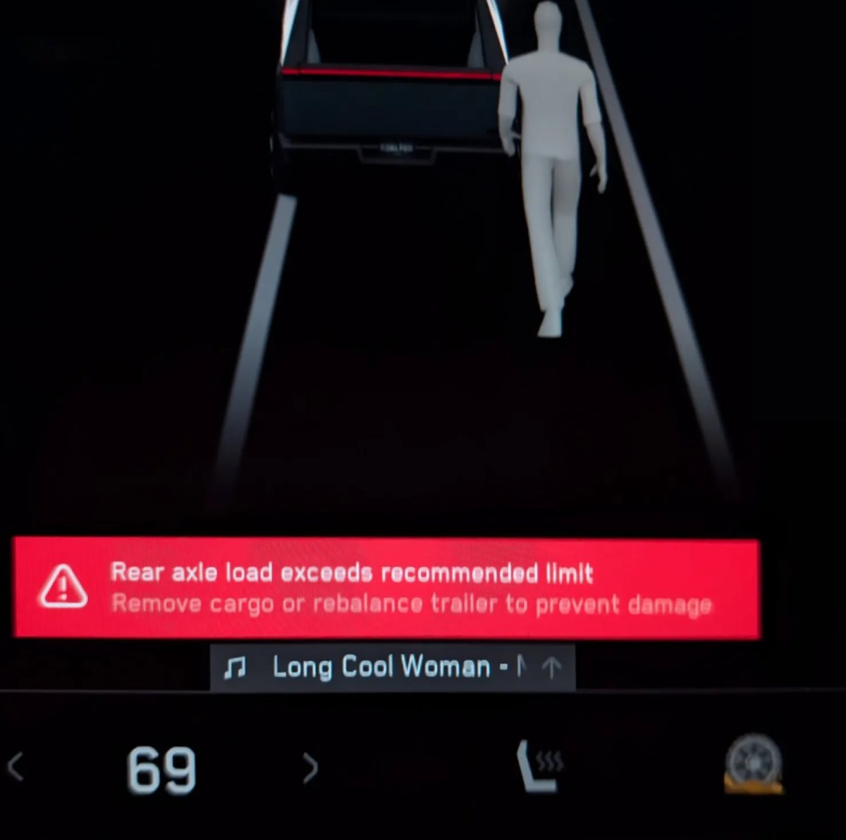 Tesla Tow Limit Exceeded feature in update 2025.26