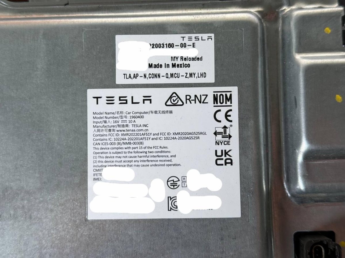 The label with "Model Y Reloaded"