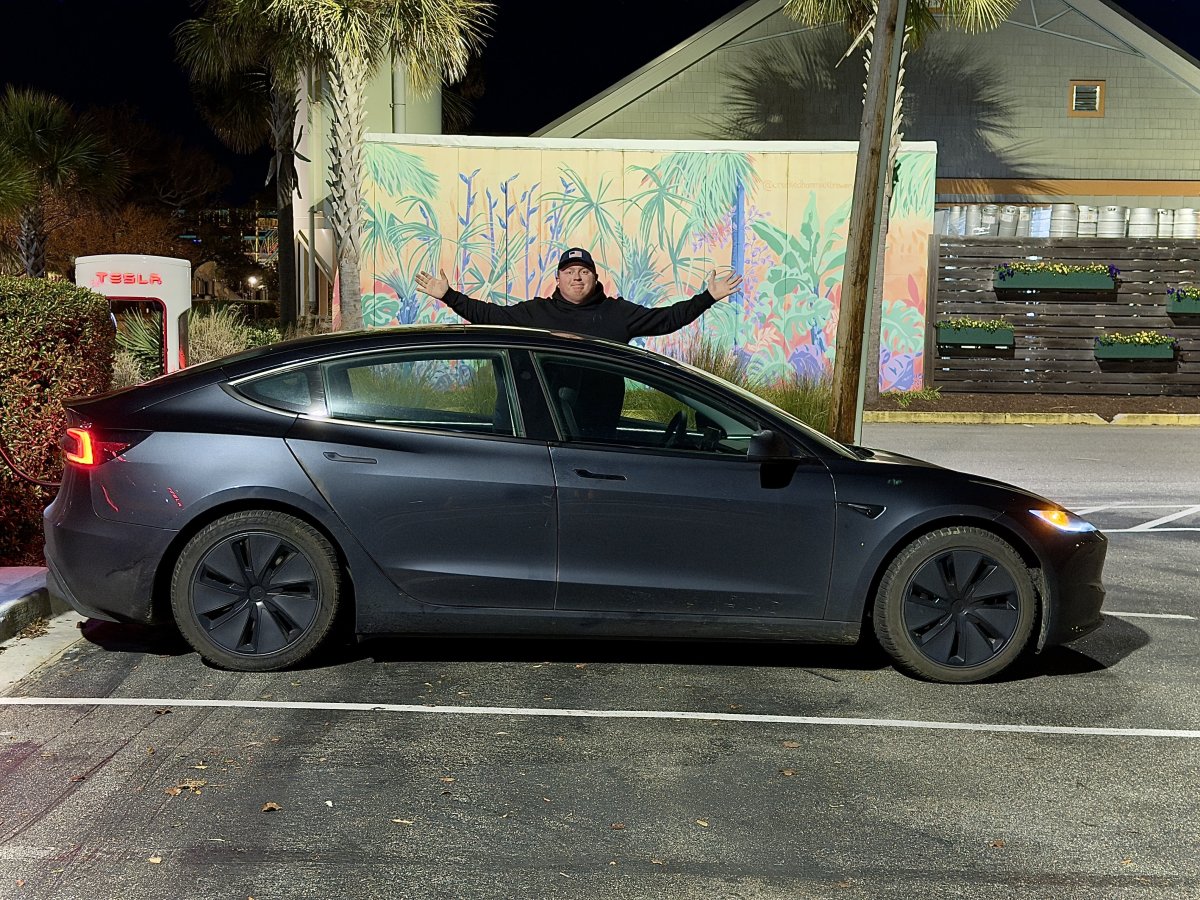 David Moss with his car, after completing his coast-to-coast journey.