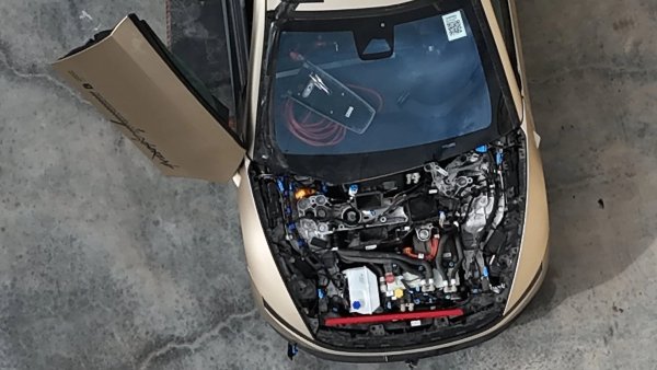Inside the Tesla Cybercab's Frunk: Massive Fluid Tank and More
